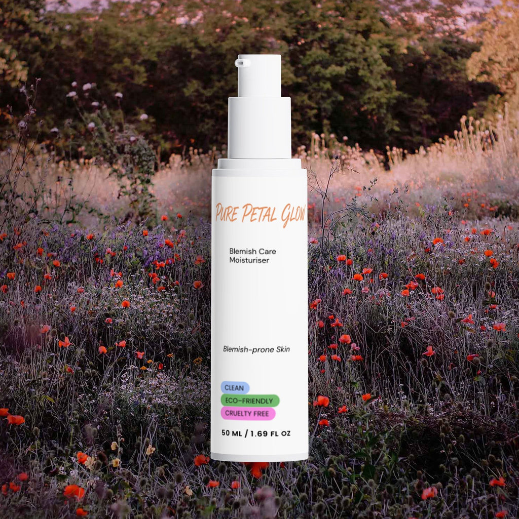 Pure Petal Glow Blemish Care Moisturizer bottle in a field of wildflowers at dusk.