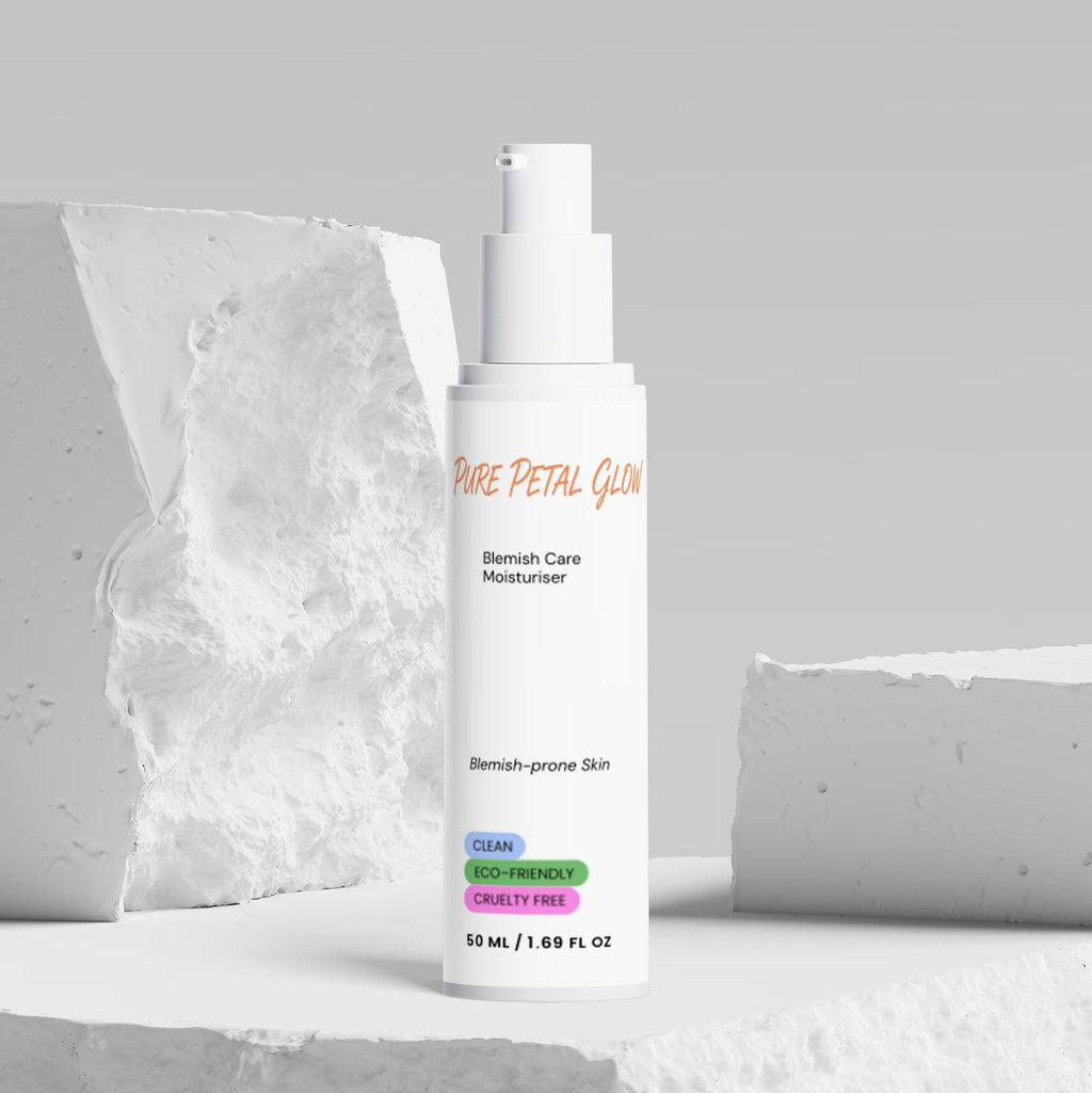 Pure Petal Glow Blemish Care Moisturizer bottle beside white sculptural blocks.