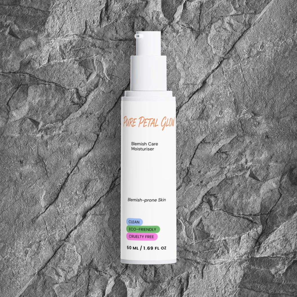 Pure Petal Glow Blemish Care Moisturizer bottle on textured gray stone.